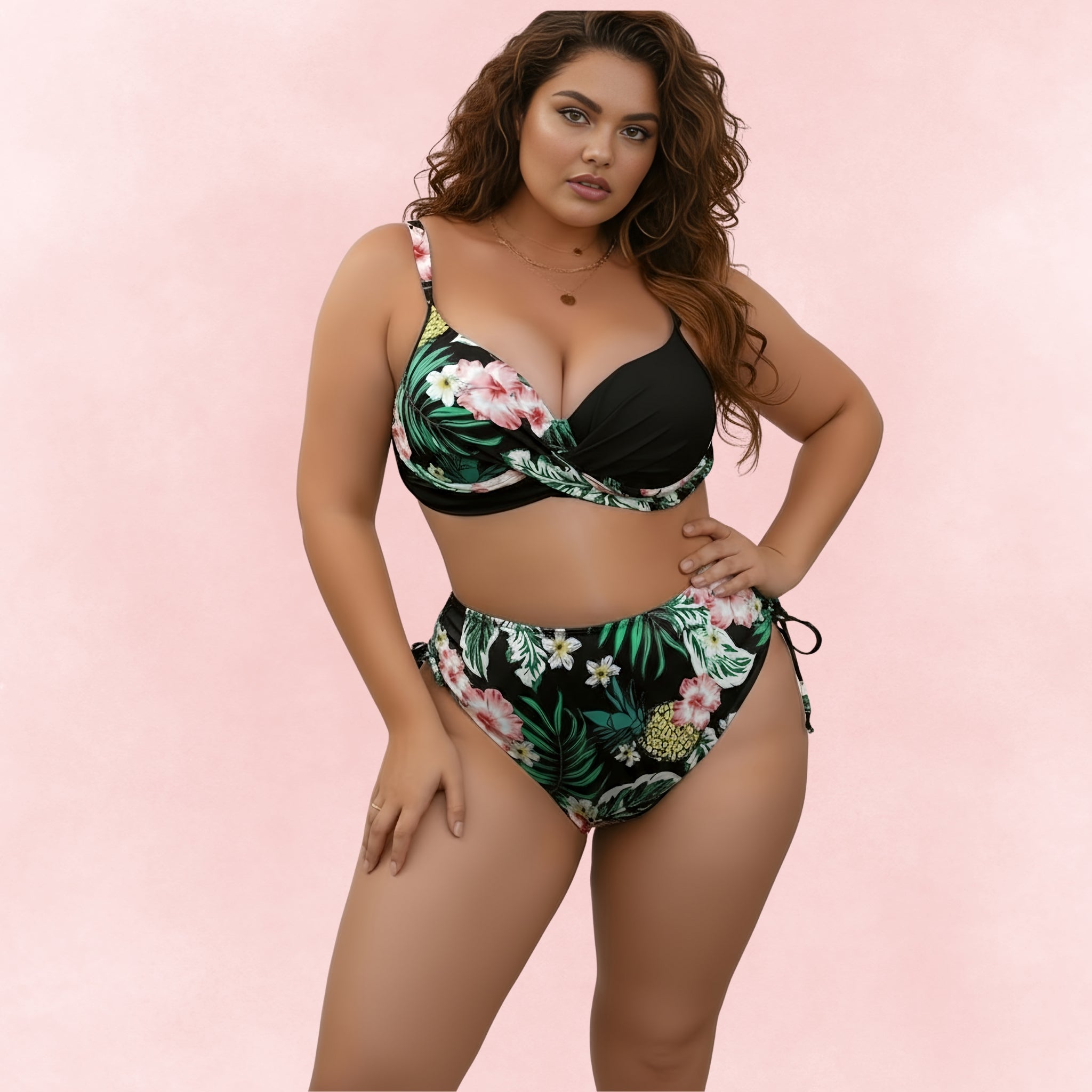 Plus size black bikini with tropical floral print, high waist bottom and supportive twist front top.