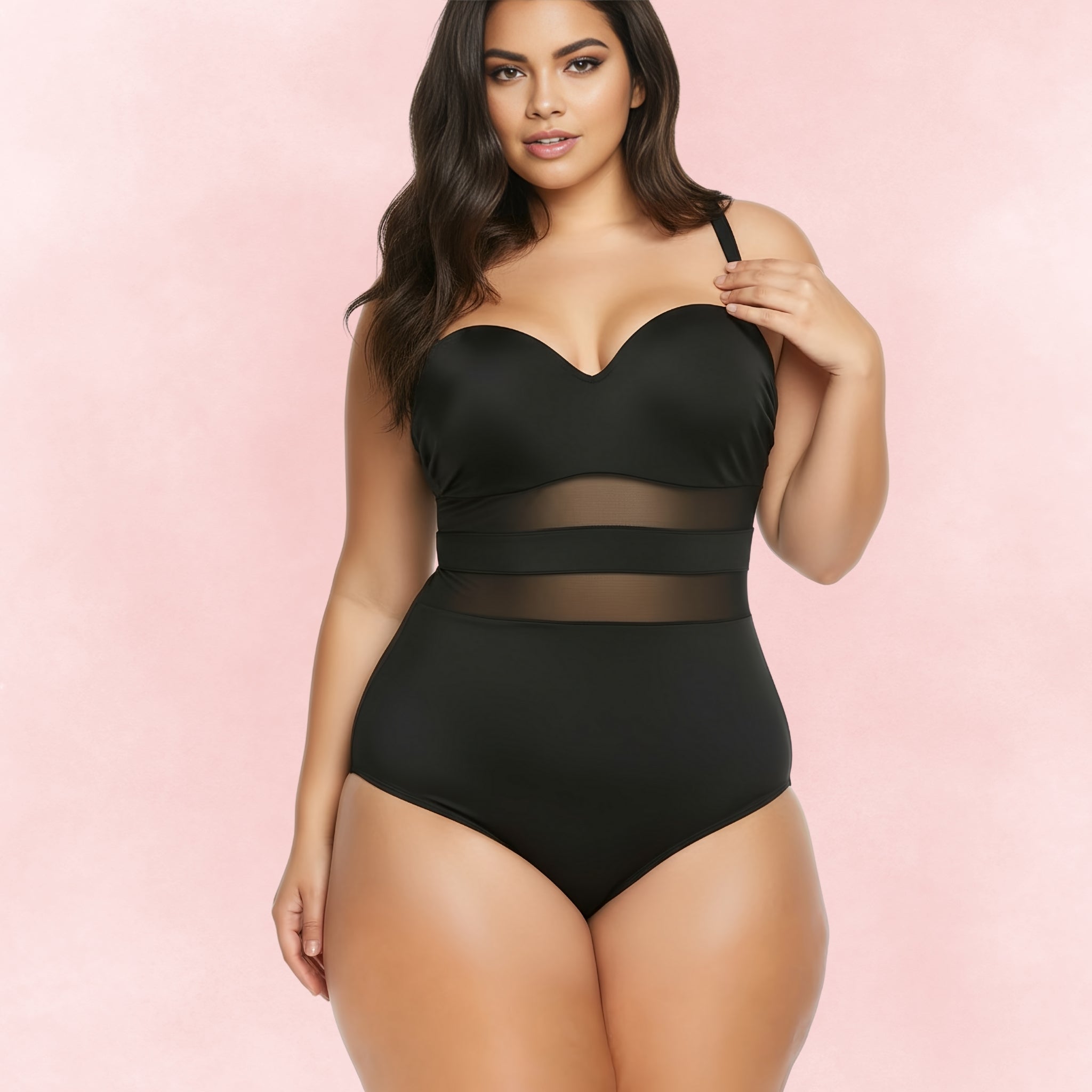Plus size black one-piece swimsuit with sweetheart neckline and sheer mesh waist panels, front view