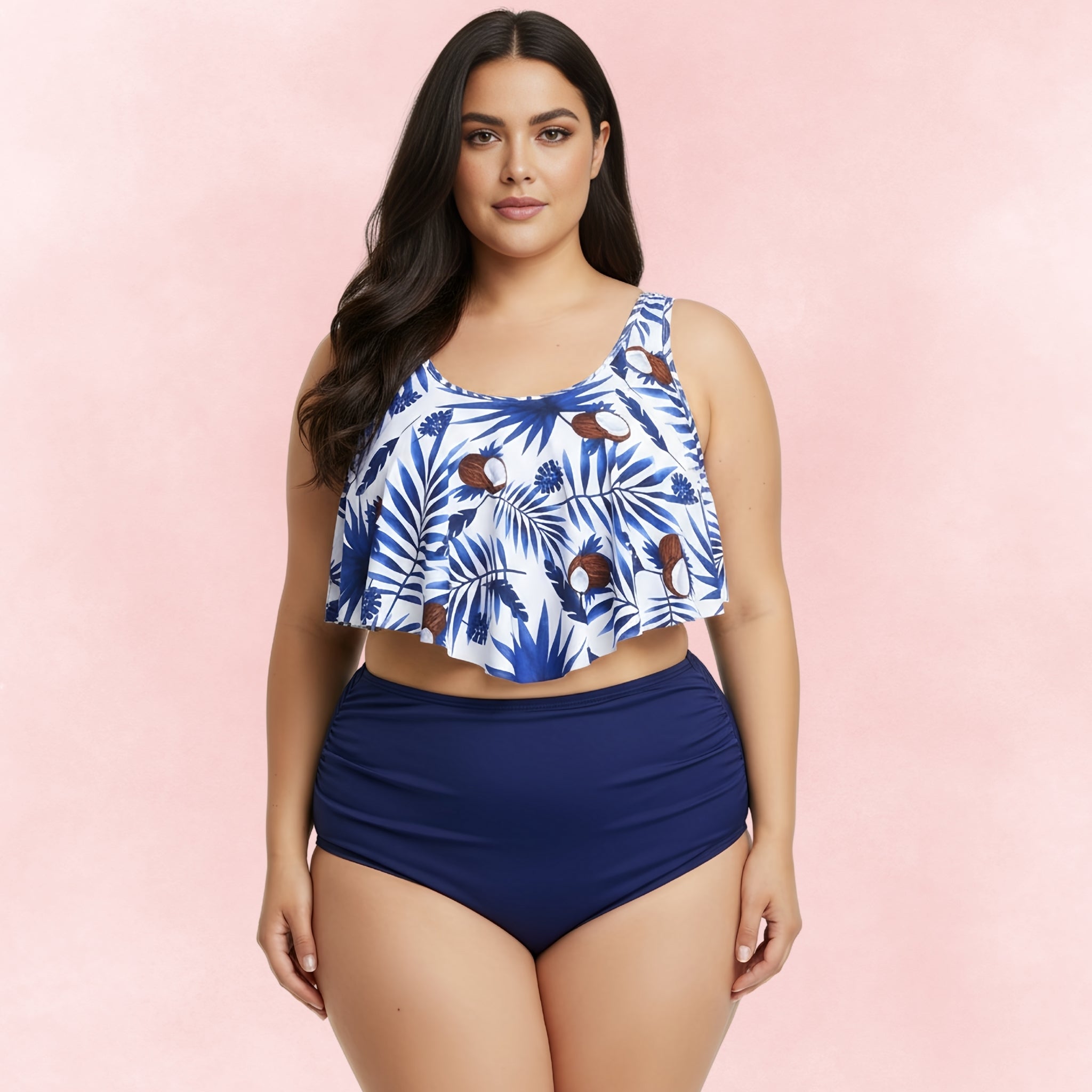 Plus size bikini with white and blue coconut leaf print ruffle top and navy high waist bottoms, front view