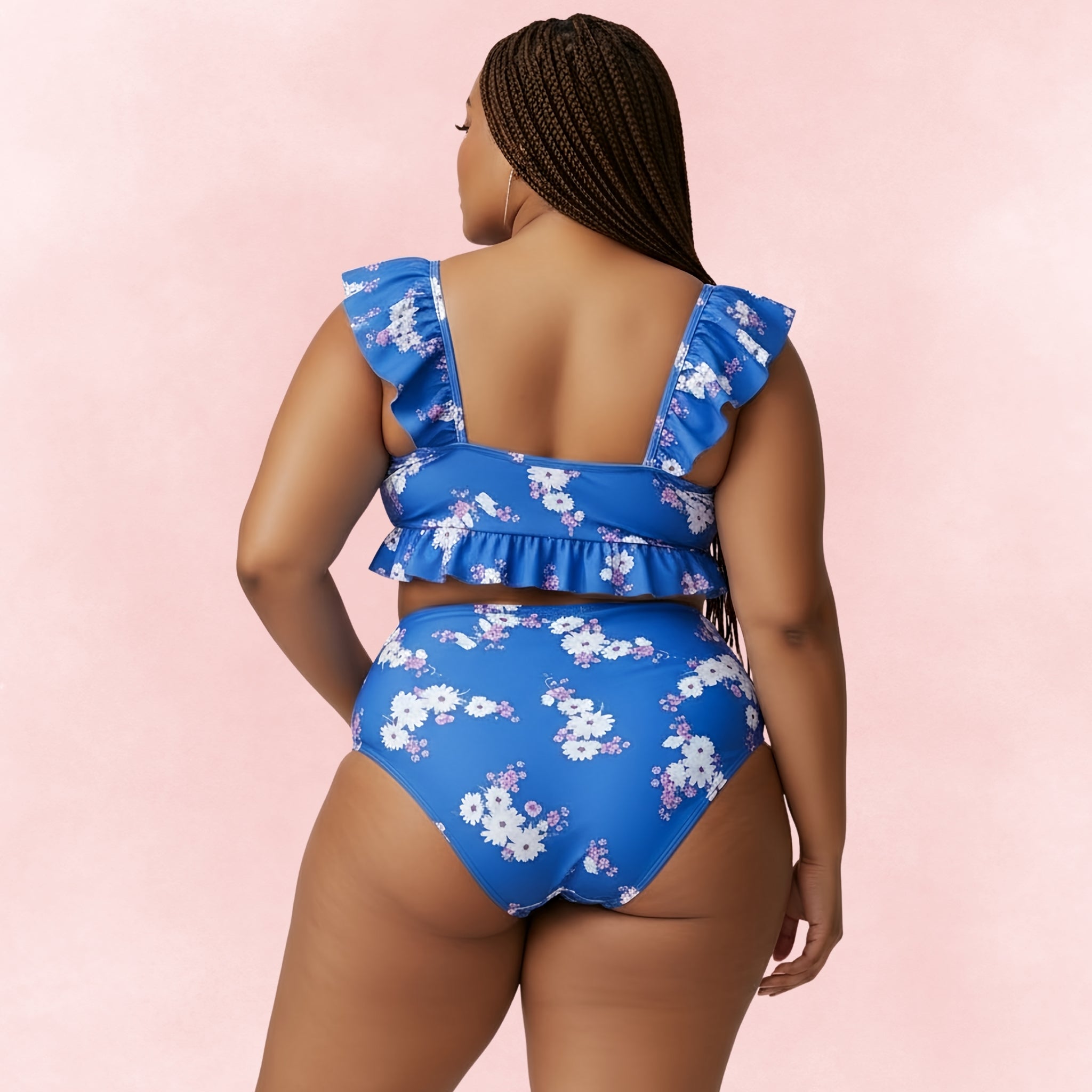Back view of plus size blue floral bikini set with ruffle straps and high-waisted bottoms.
