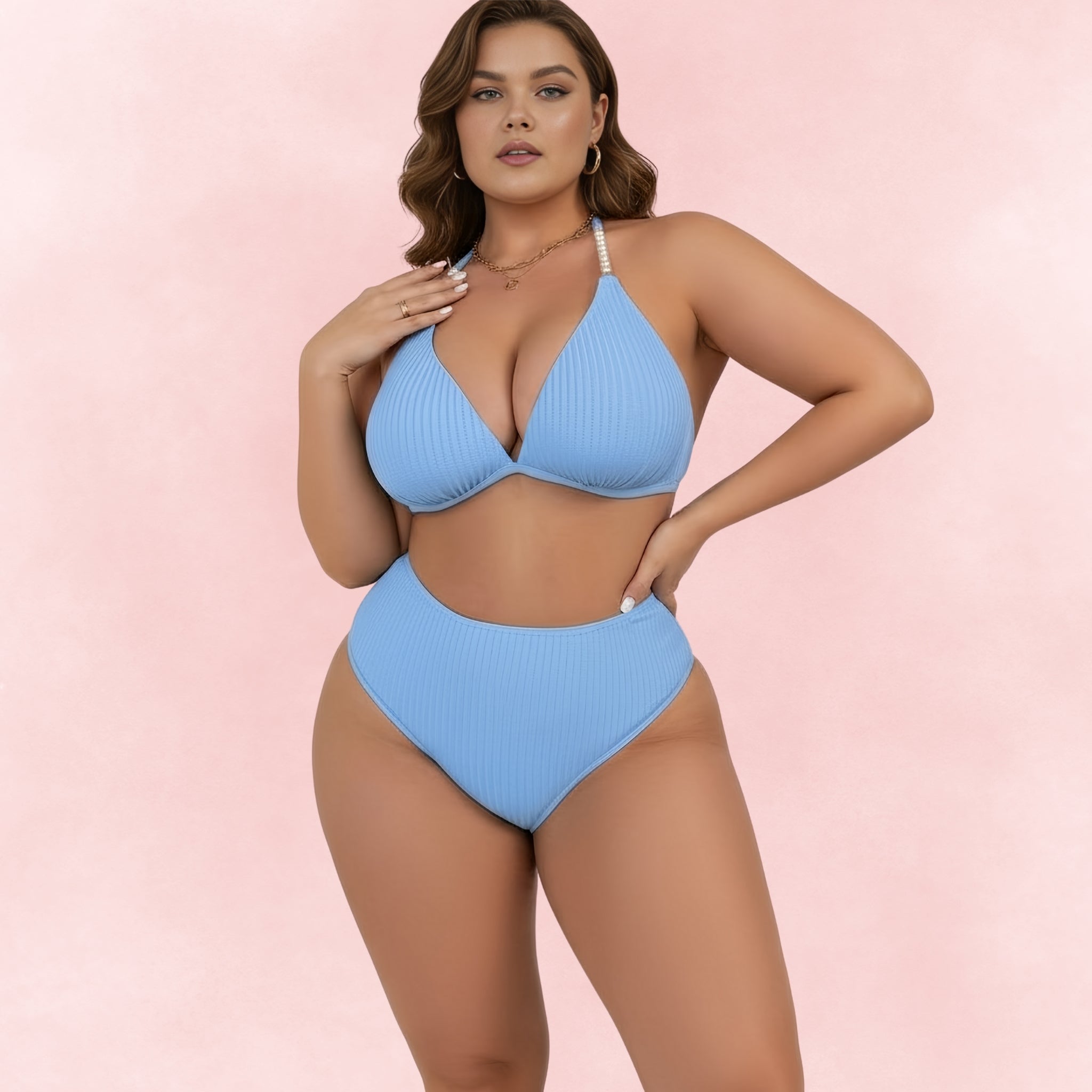 Front view of plus size woman wearing blue ribbed bikini with pearl strap halter top and high waist bottoms