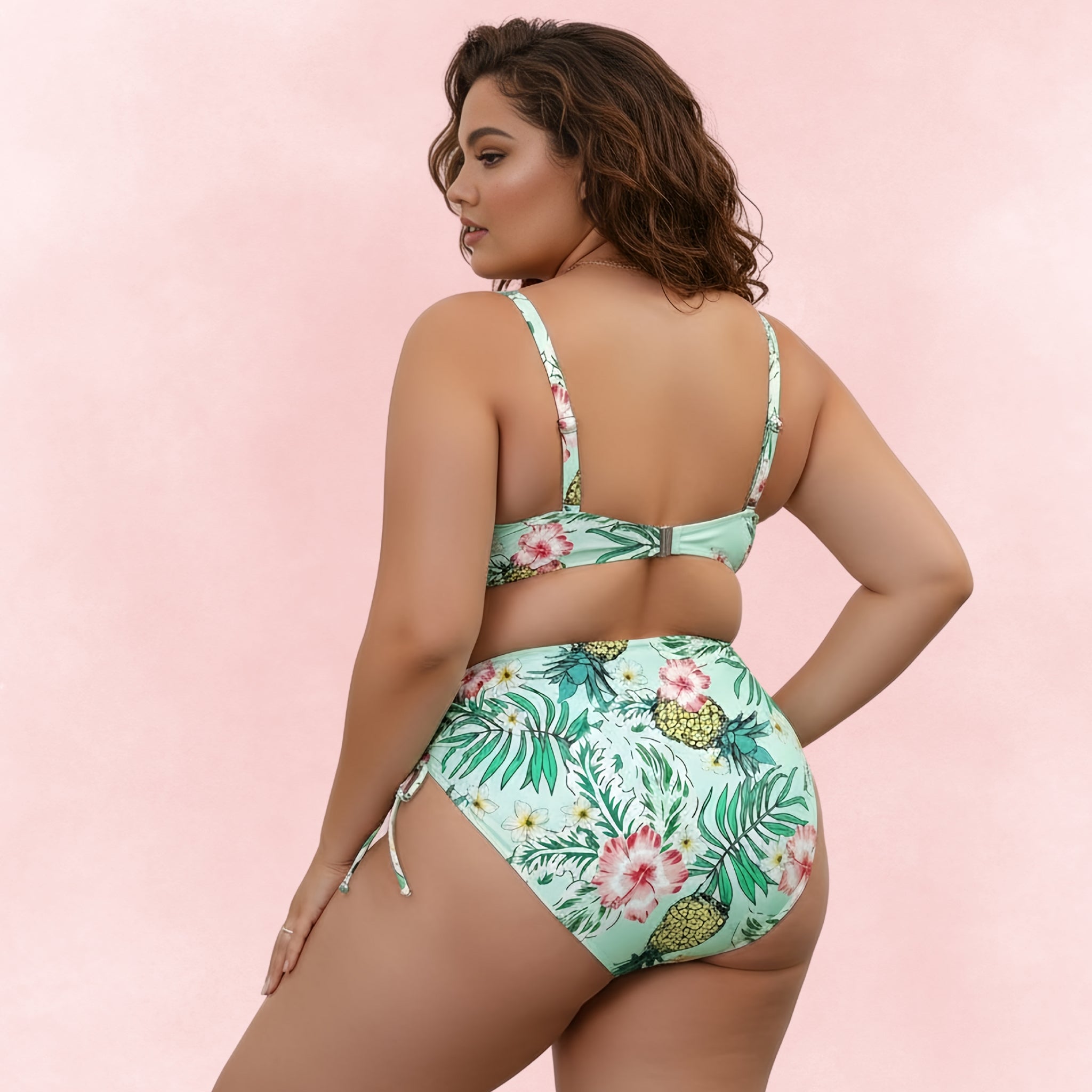 Plus size green floral bikini with pineapple print, high waist side-tie bottom and supportive bikini top.