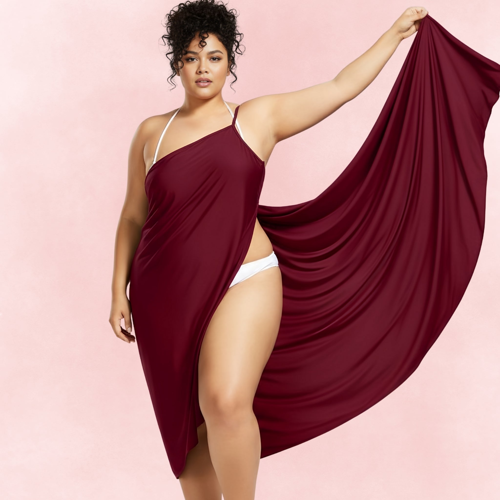 Elegant maroon asymmetrical sarong beach cover-up for plus-size women, styled with a flowing drape and lightweight fabric