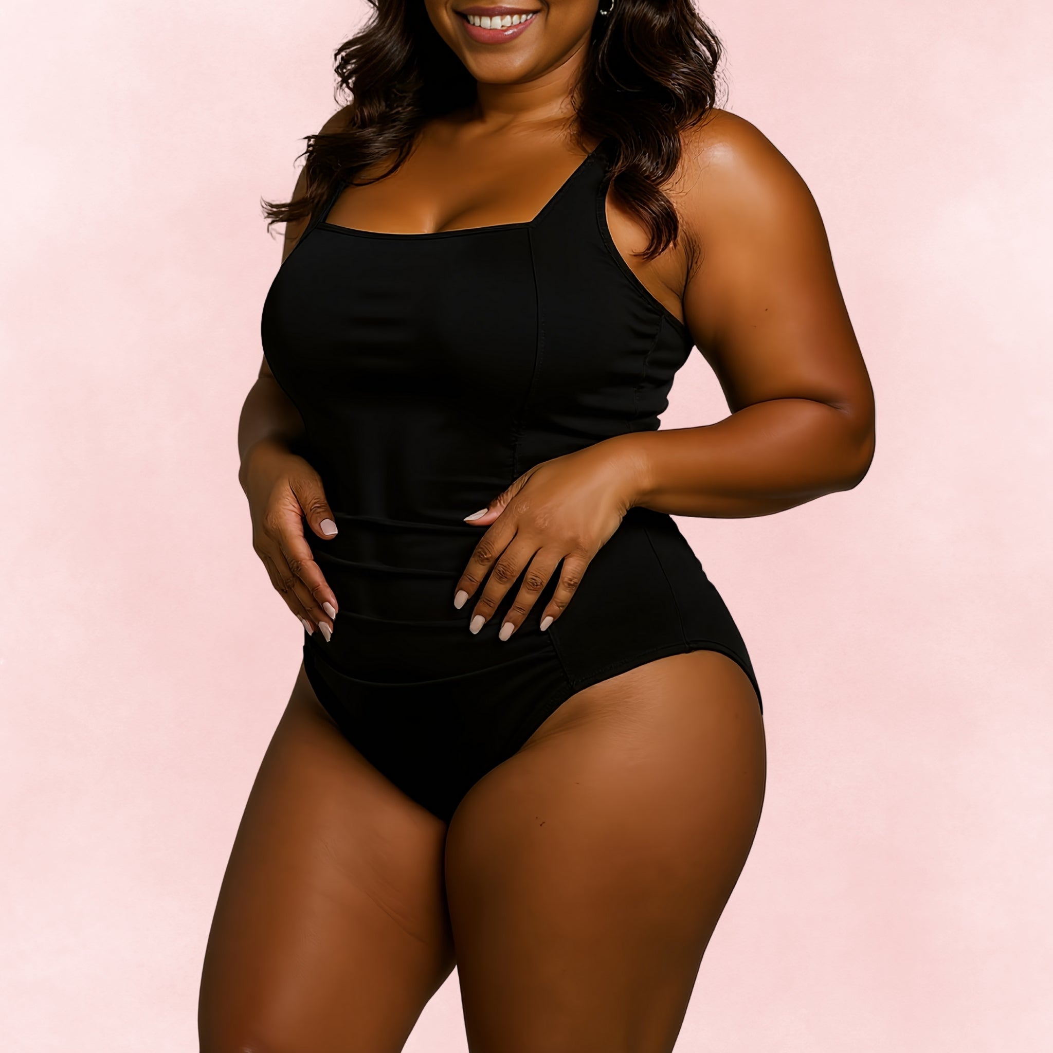Plus size black one-piece swimsuit with ruched front and wide straps