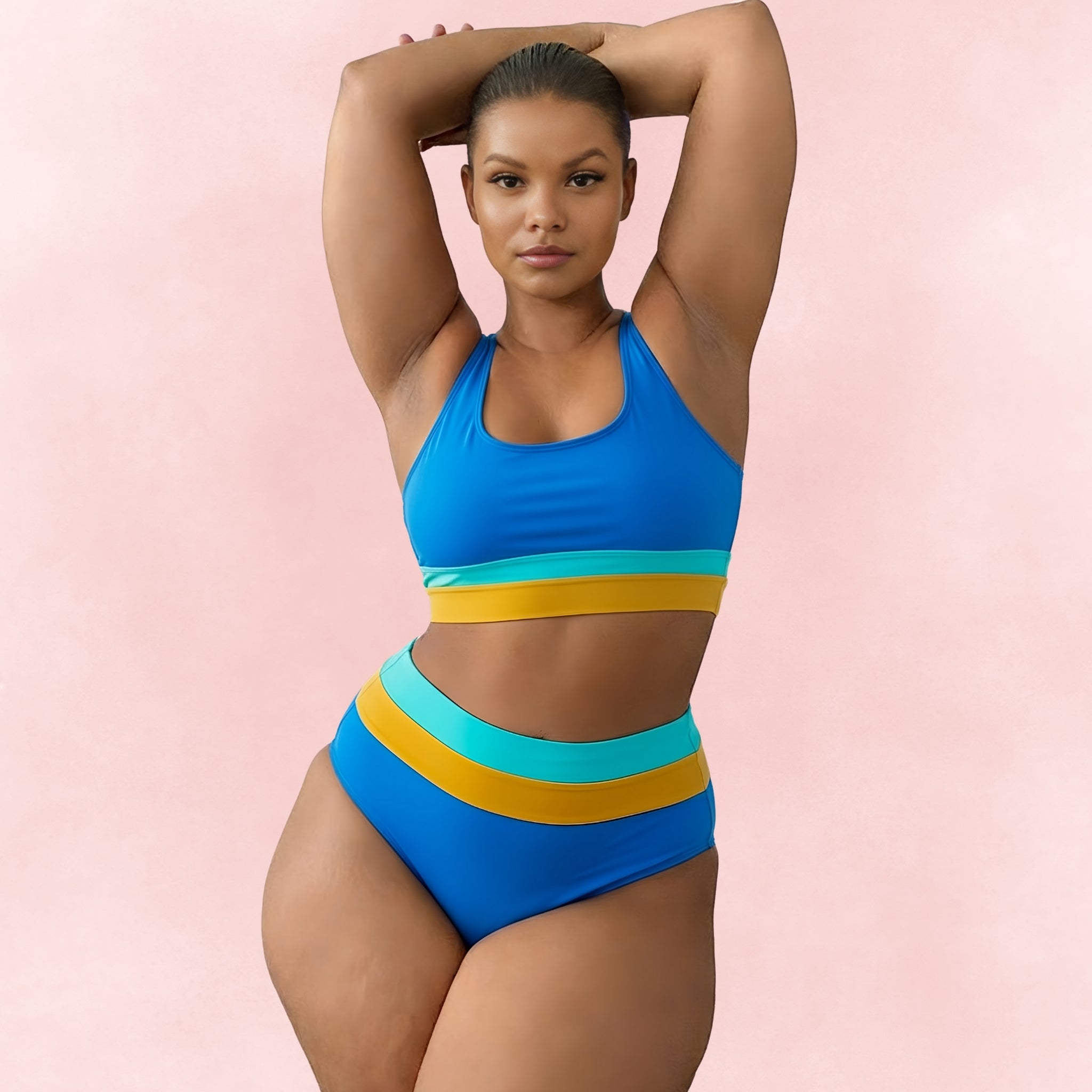 Plus size sporty bikini in blue with yellow and aqua bands, crop top style, and high waist bottom – front view.