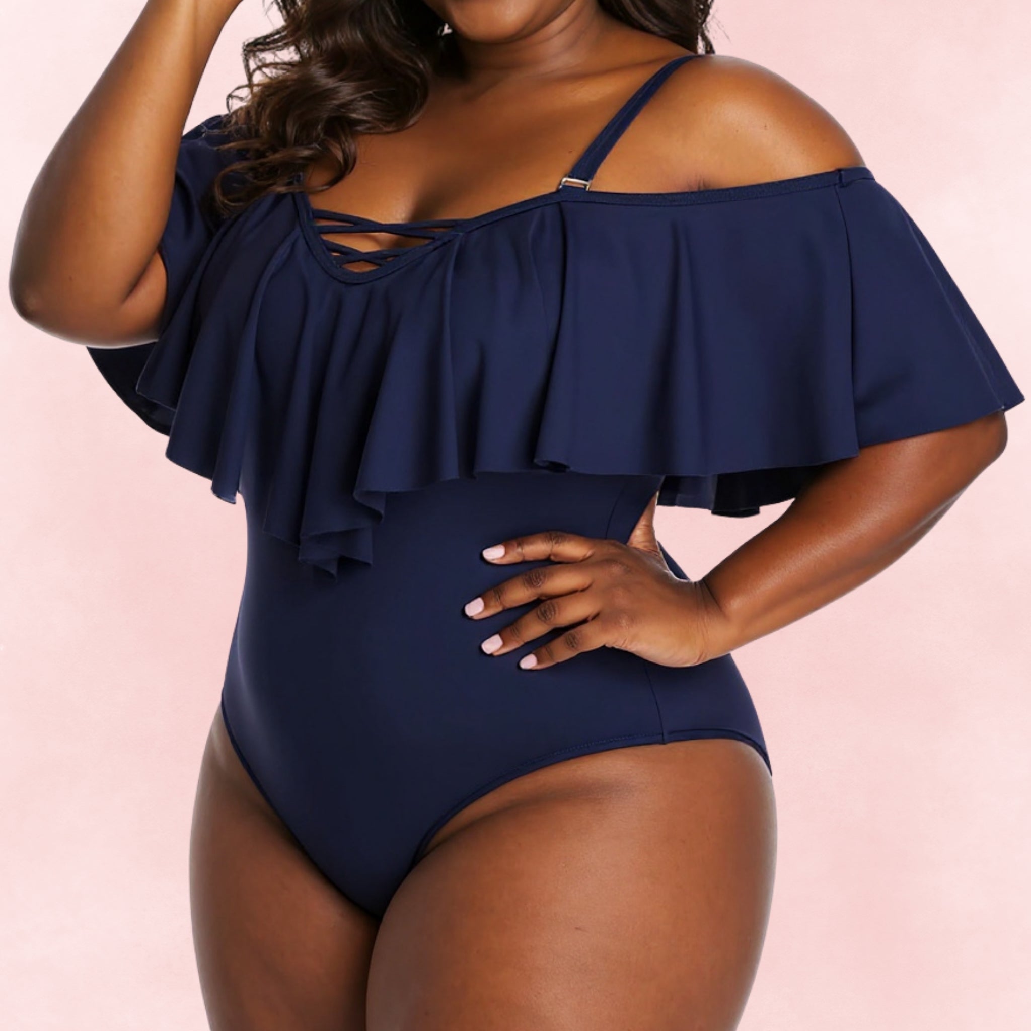 Plus size navy one-piece swimsuit with off-shoulder ruffle design and adjustable straps