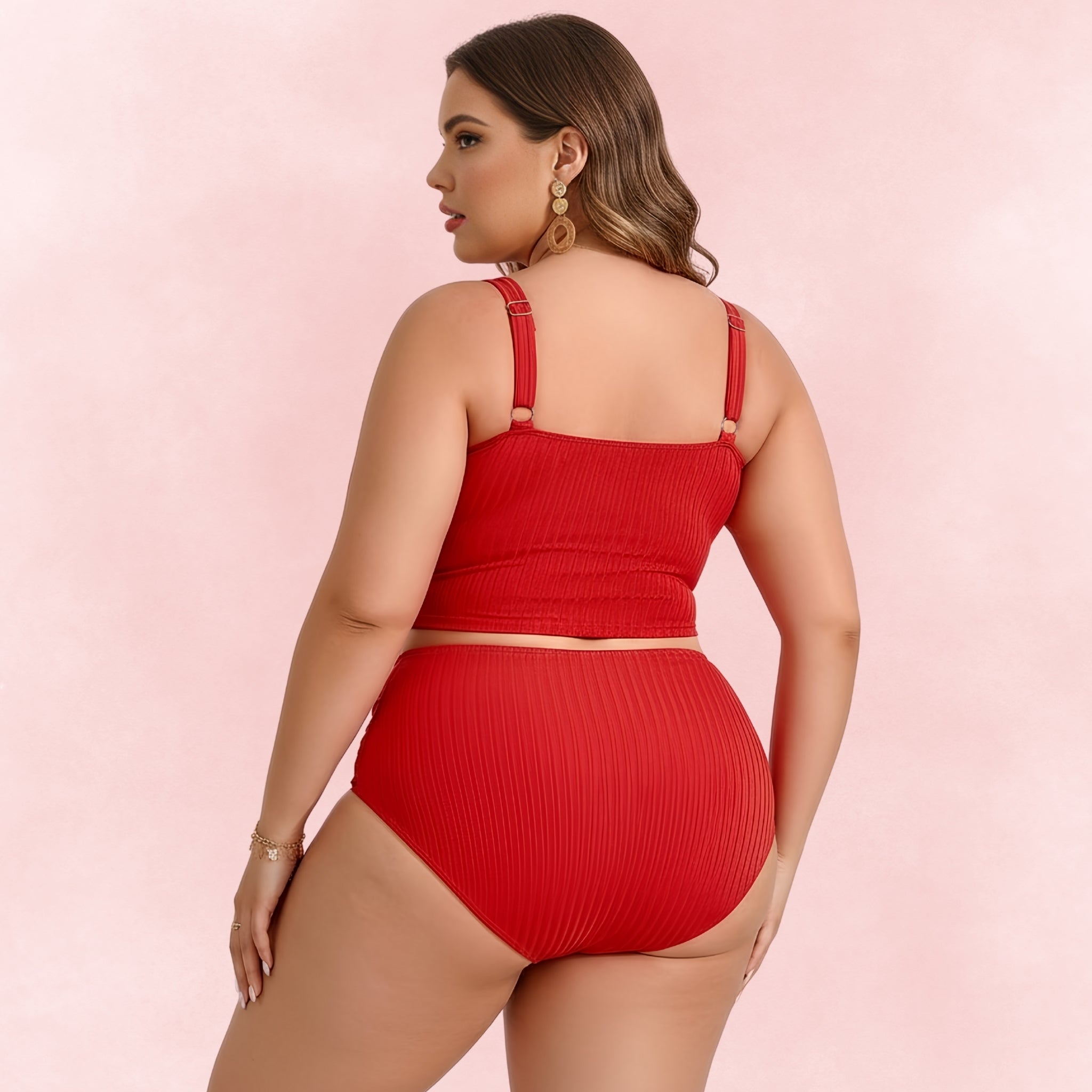 Back view of plus size woman wearing a red ribbed high-waist bikini set with adjustable straps.