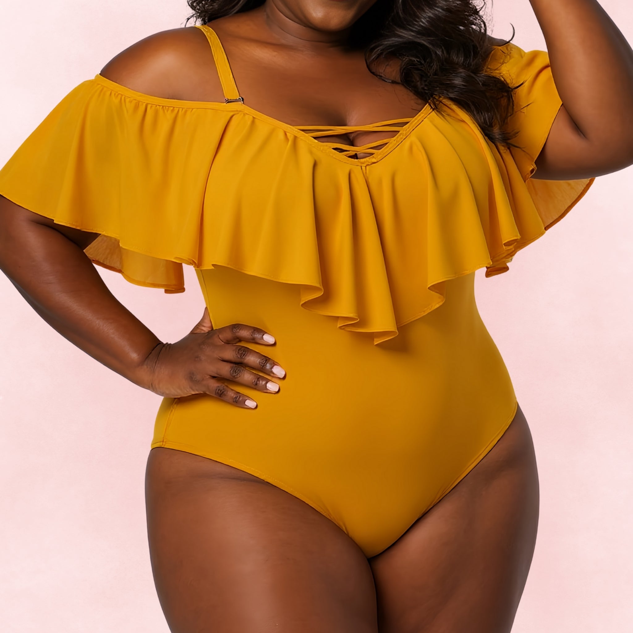 Plus size yellow one-piece swimsuit with off-shoulder ruffle detail and crisscross neckline