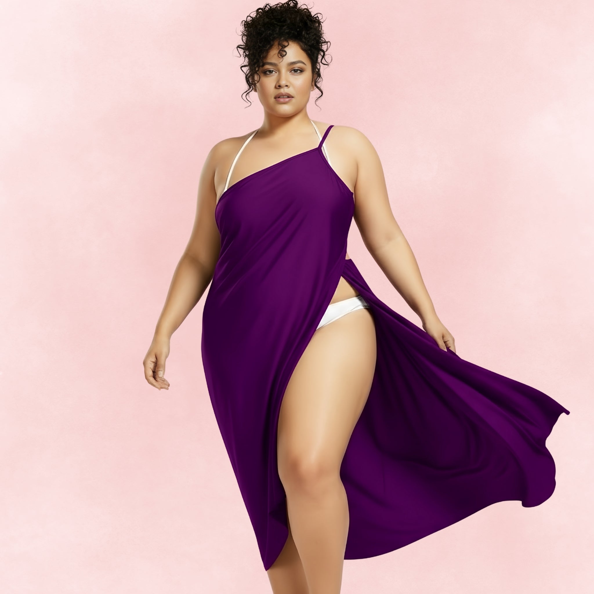Vibrant purple asymmetrical sarong beach cover-up, designed with a breezy silhouette perfect for layering over swimwear