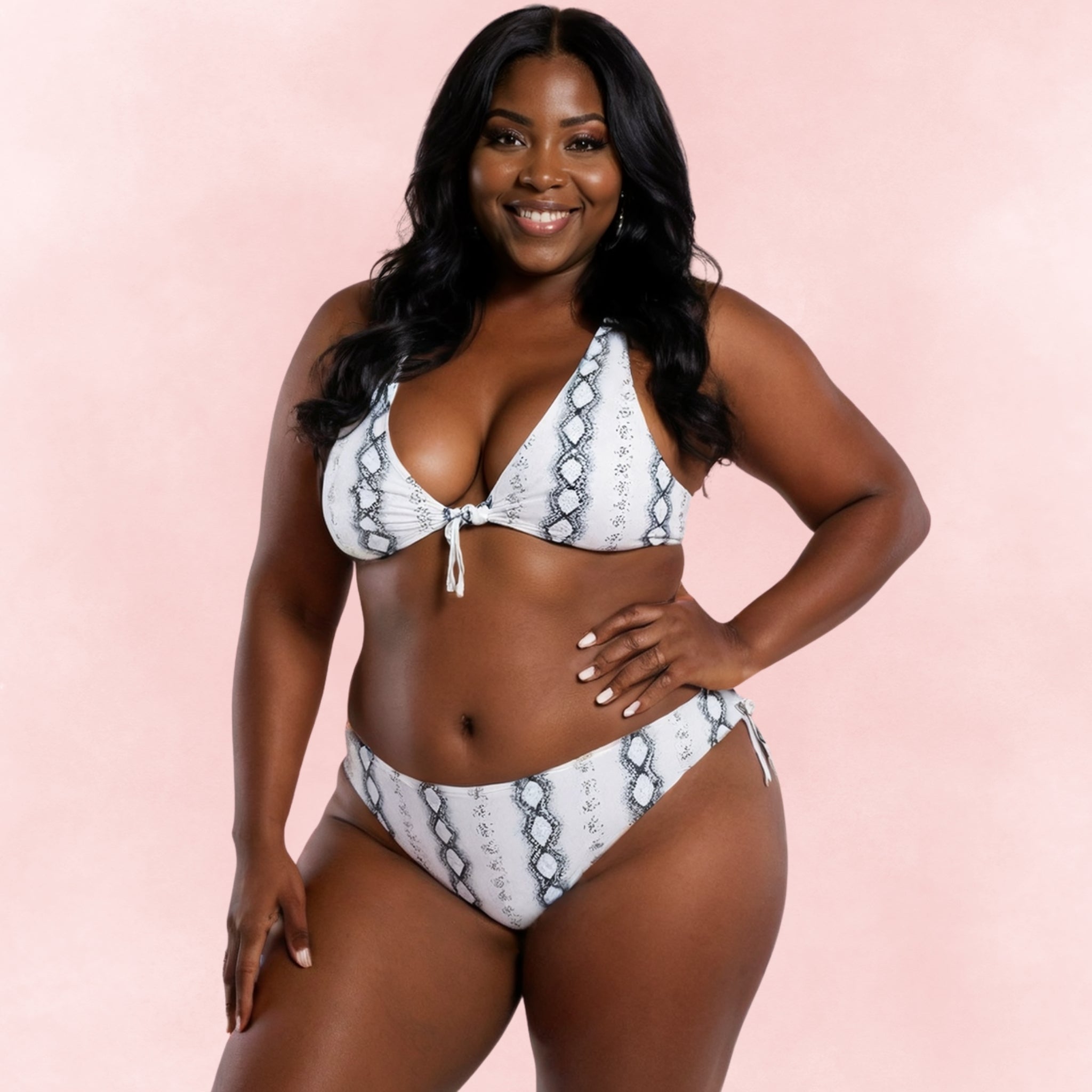 Plus size snake print bikini set with triangle top and adjustable tie sides.